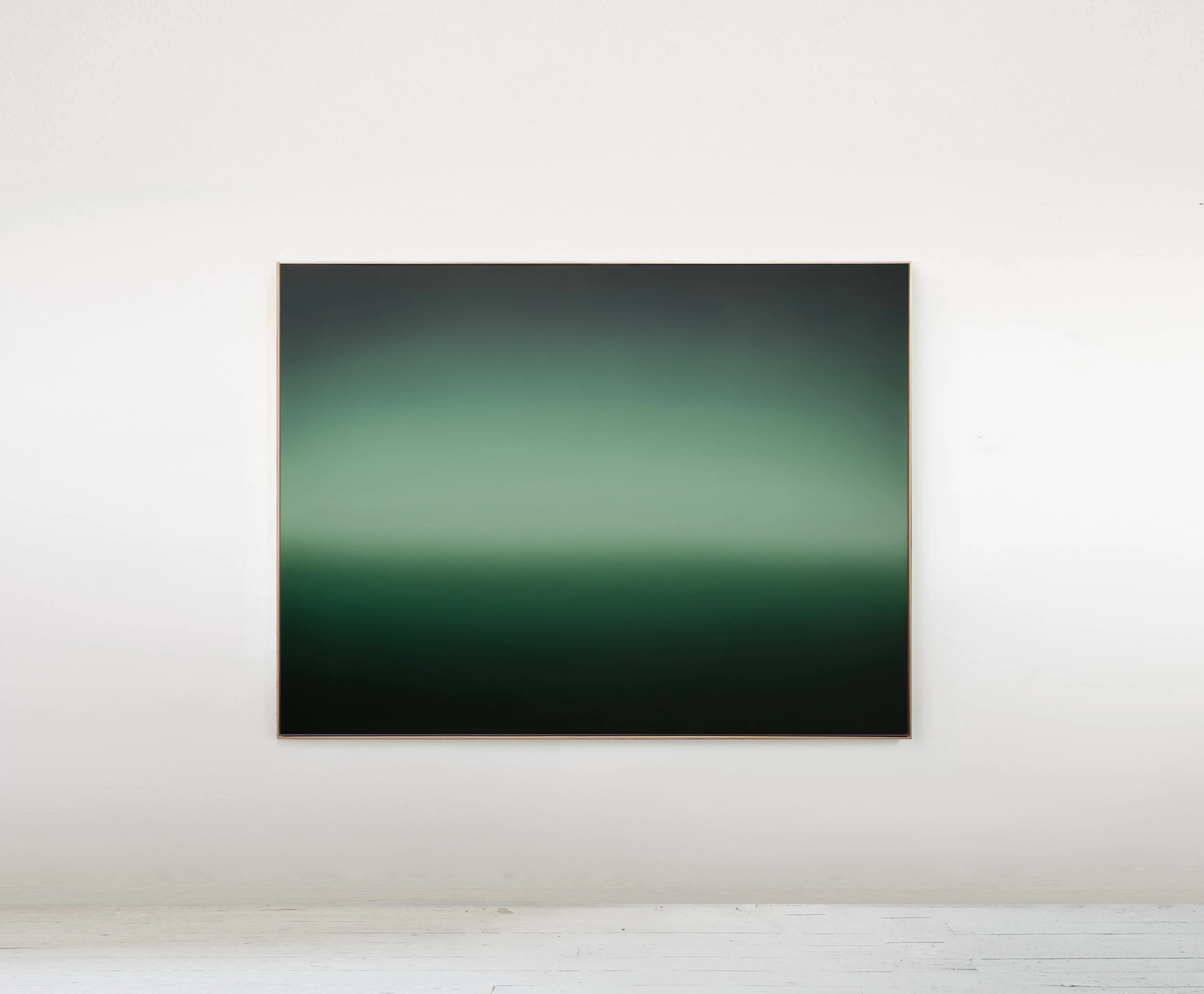 A wide painting in which a luminous band of green rises out of near-black at the top and bottom edges.